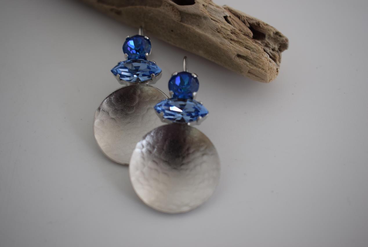 Santorini earrings with crystal – Greek hammered jewelry in 18K gold plated, 18K silver plated, and rose gold plated. Handcrafted earrings with hammered discs and sparkling crystals inspired by the island of Santorini.