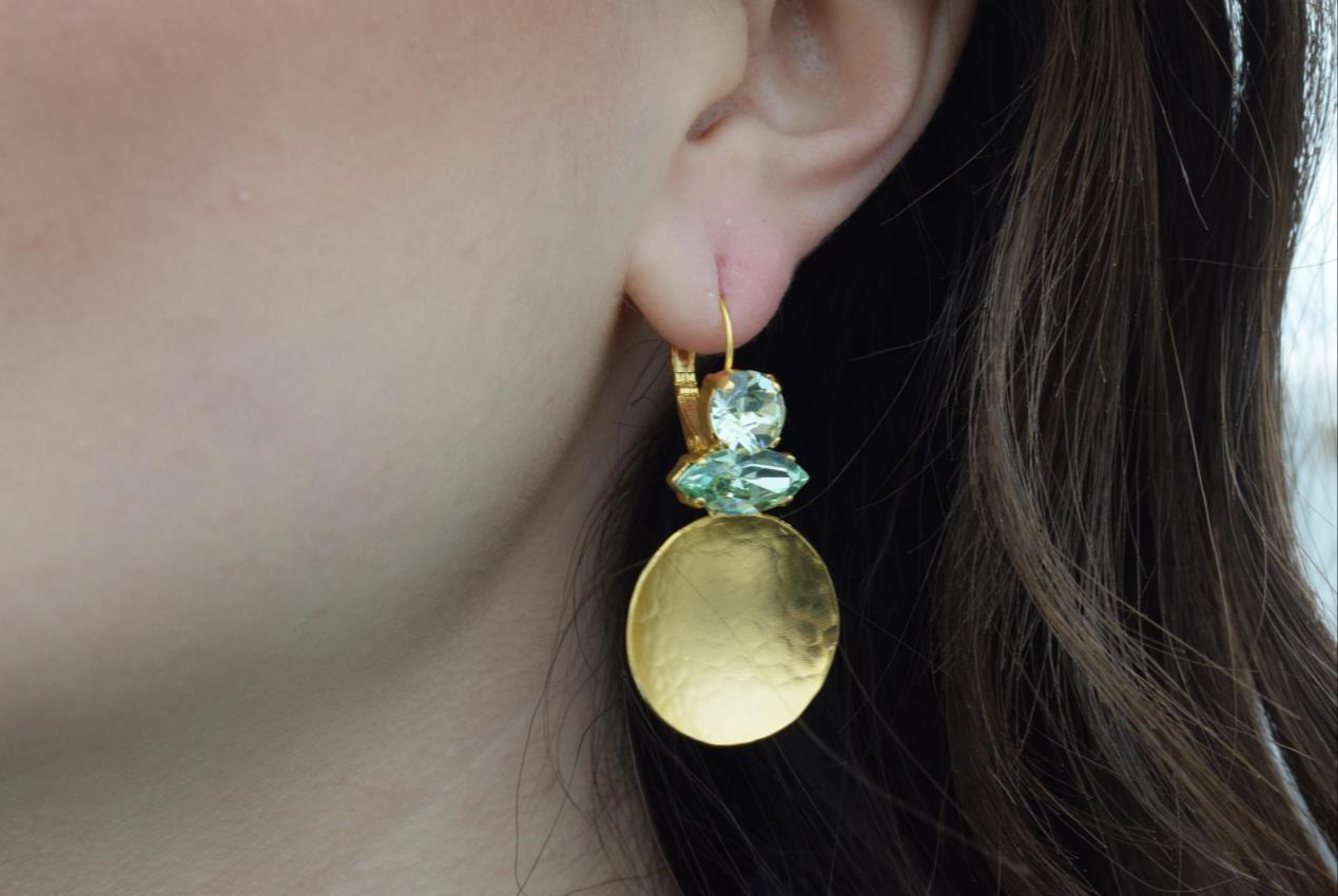 Santorini earrings with crystal – Greek hammered jewelry in 18K gold plated, 18K silver plated, and rose gold plated. Handcrafted earrings with hammered discs and sparkling crystals inspired by the island of Santorini.