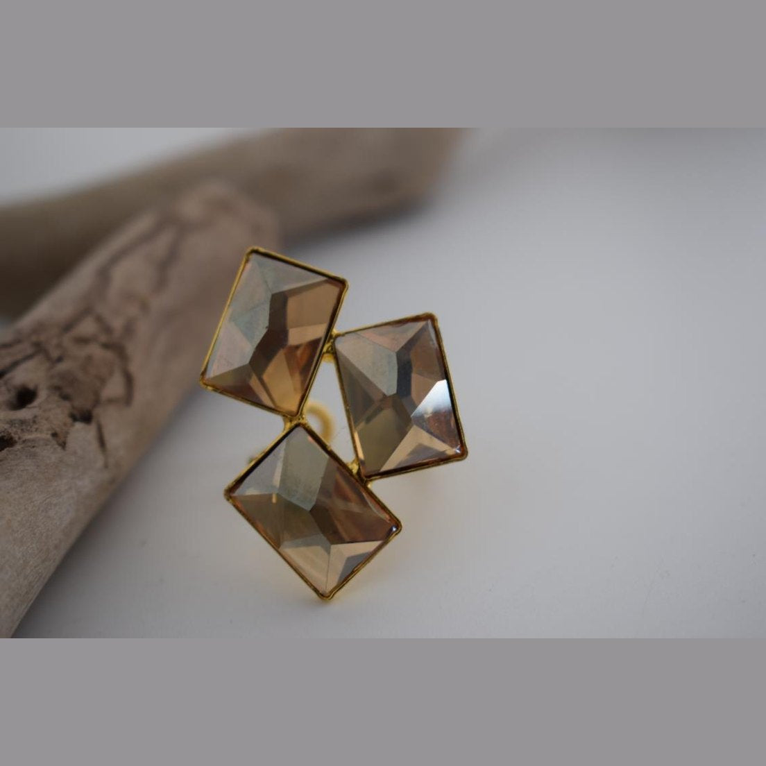Crete Ring with Crystal – Greek hammered jewelry in 18K gold plated, 18K silver plated, and rose gold plated. Handcrafted adjustable ring with bold faceted crystal design inspired by Minoan Crete.