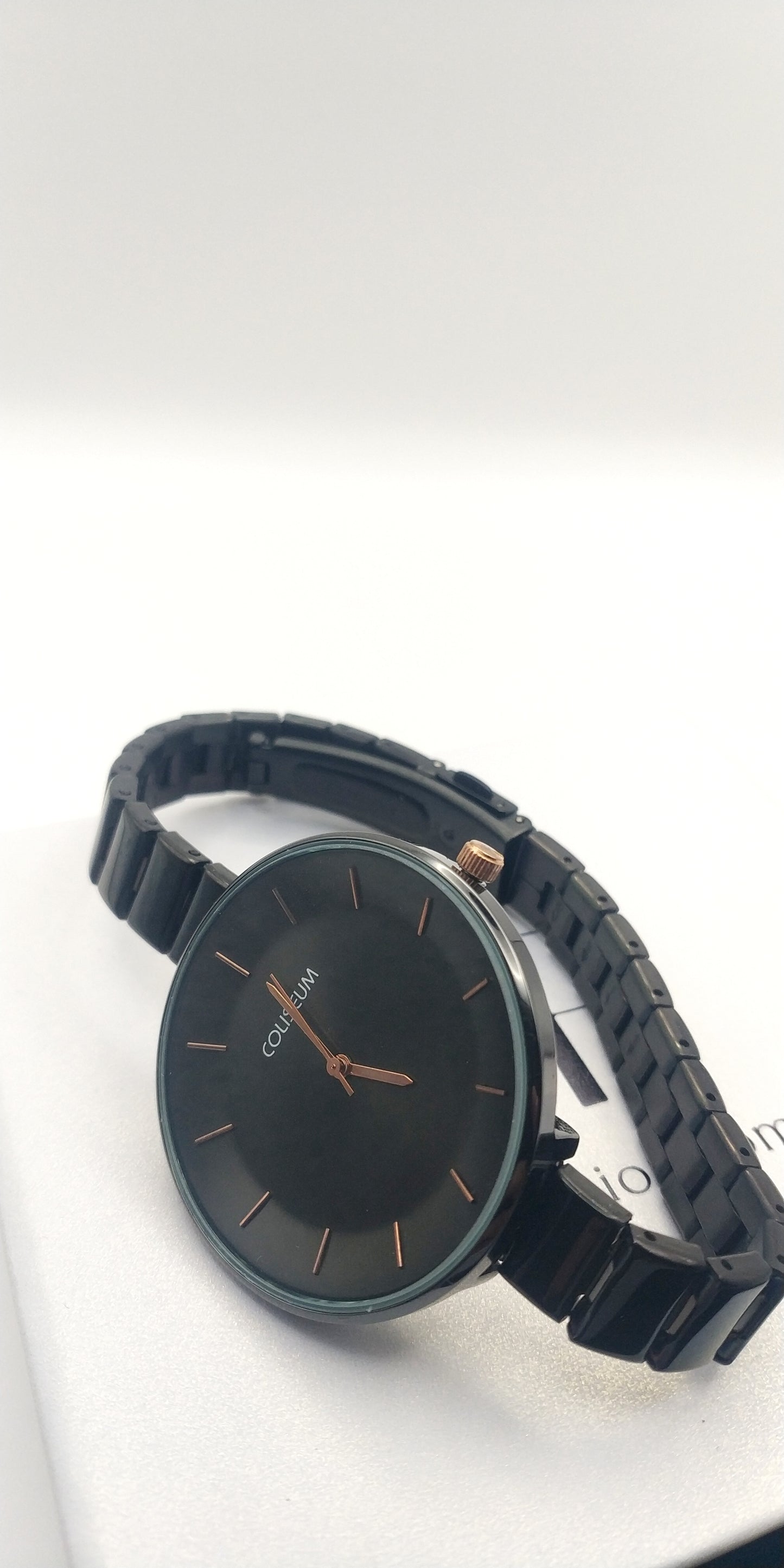 Women’s elegant black stainless steel watch with rose gold dial accents – fashion wristwatch