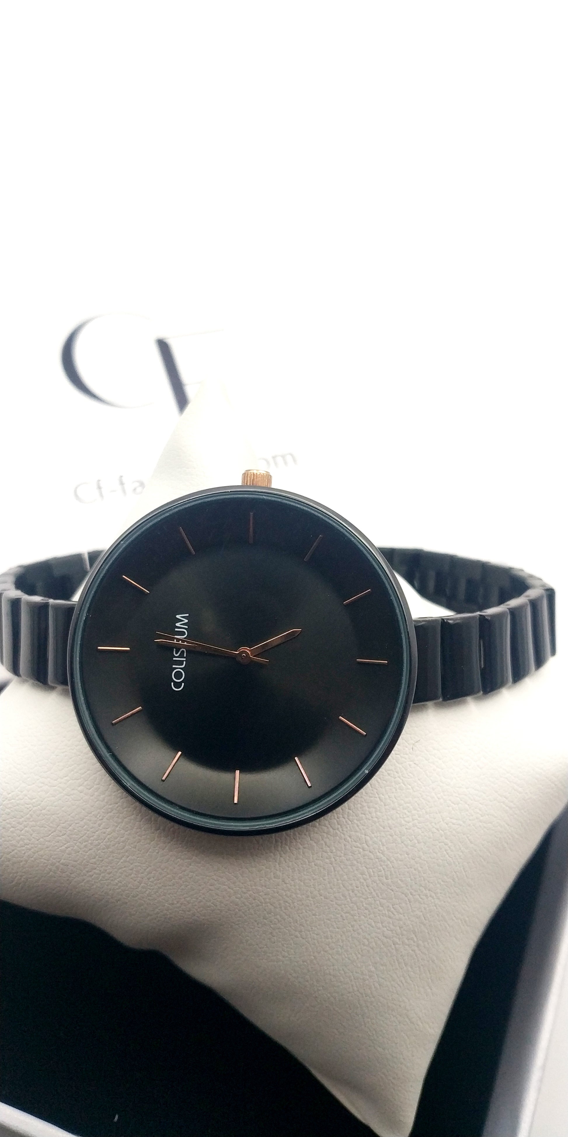 Women’s elegant black stainless steel watch with rose gold dial accents – fashion wristwatch