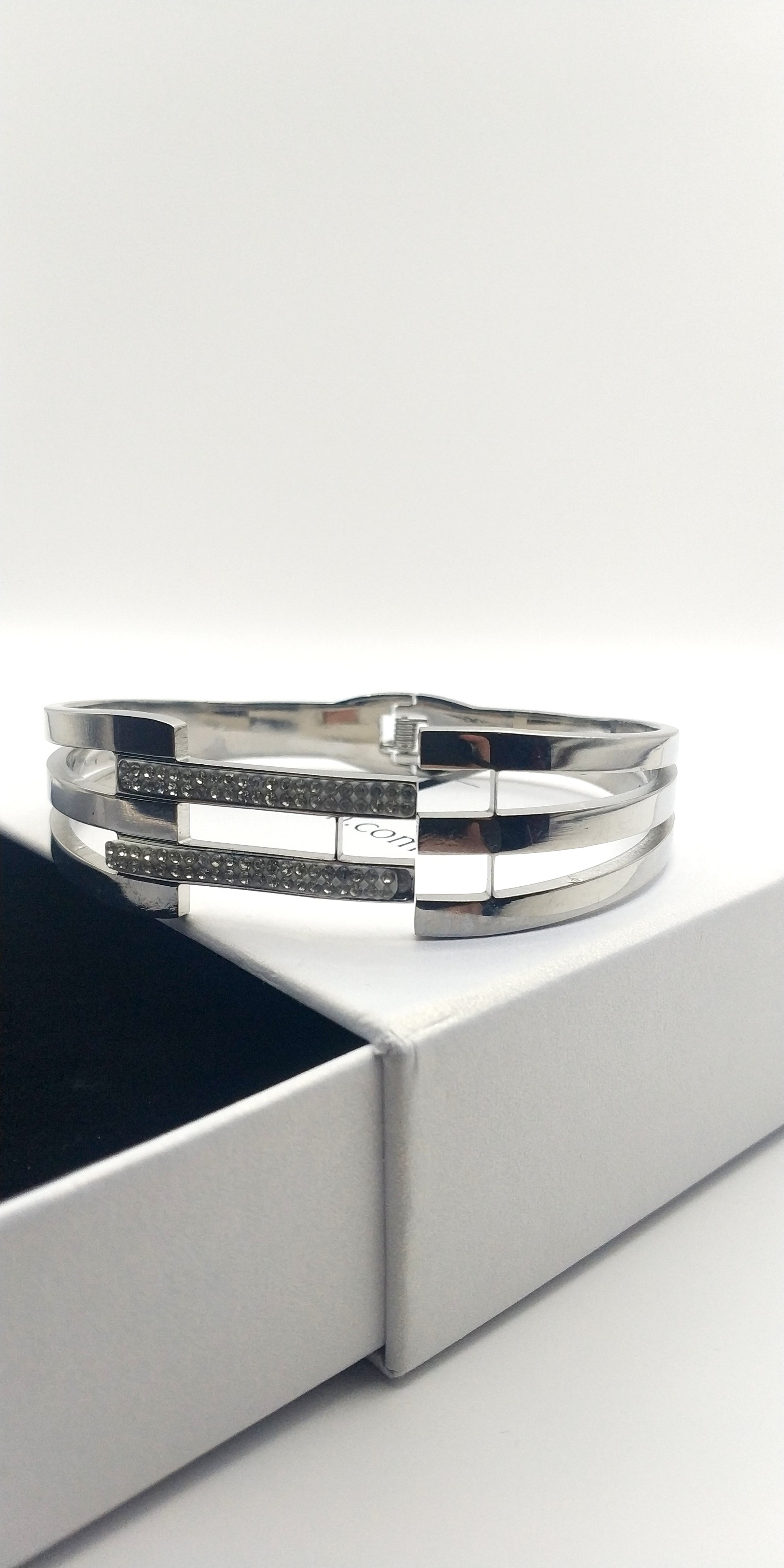 Wide Triple-Row Stainless Steel Bracelet with Central Geometric Rhinestone Connectors