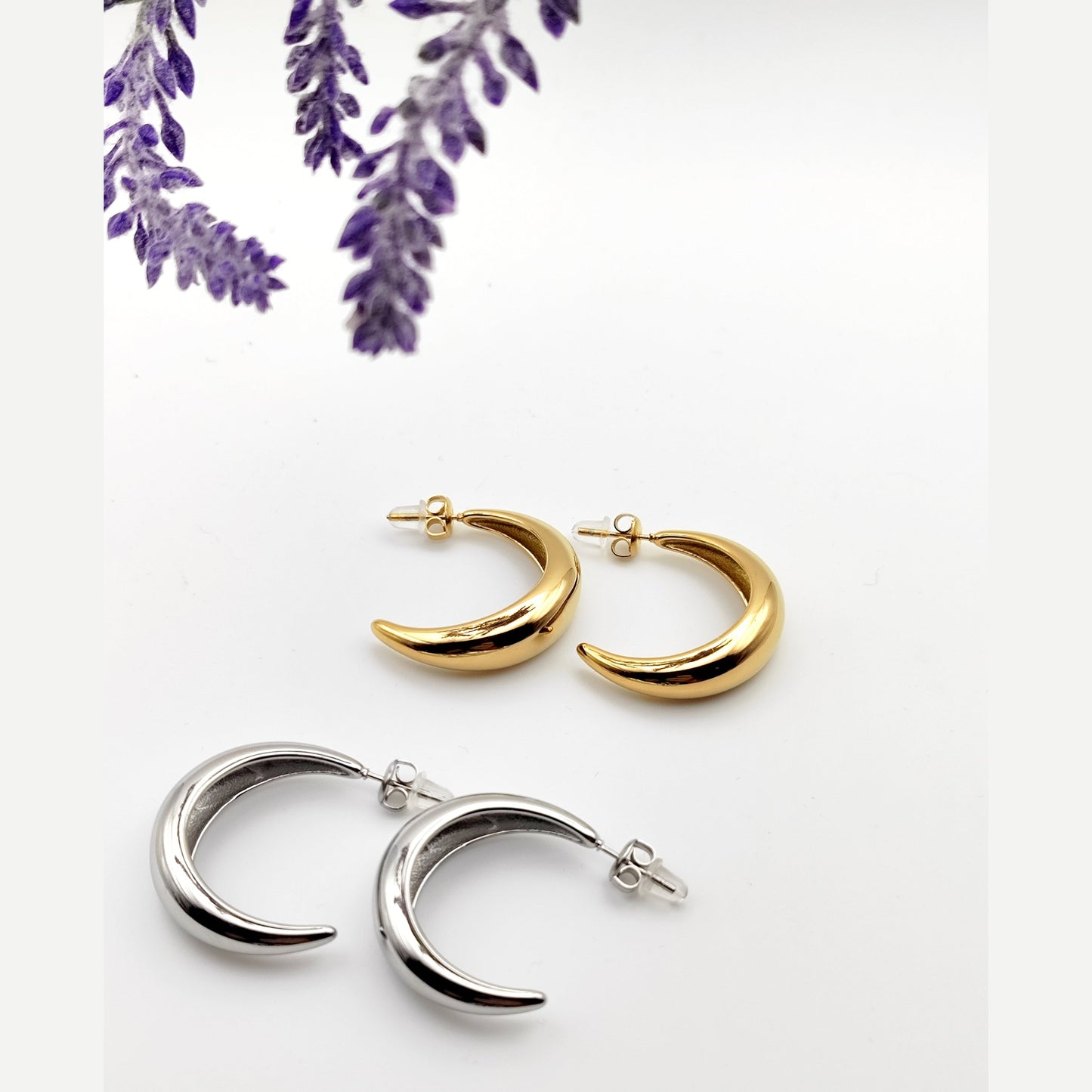 Gold and silver delicate crescent hoop earrings made of stainless steel