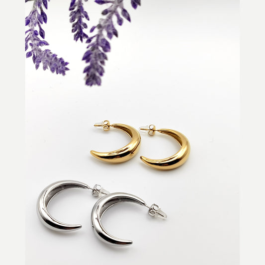 Gold and silver delicate crescent hoop earrings made of stainless steel
