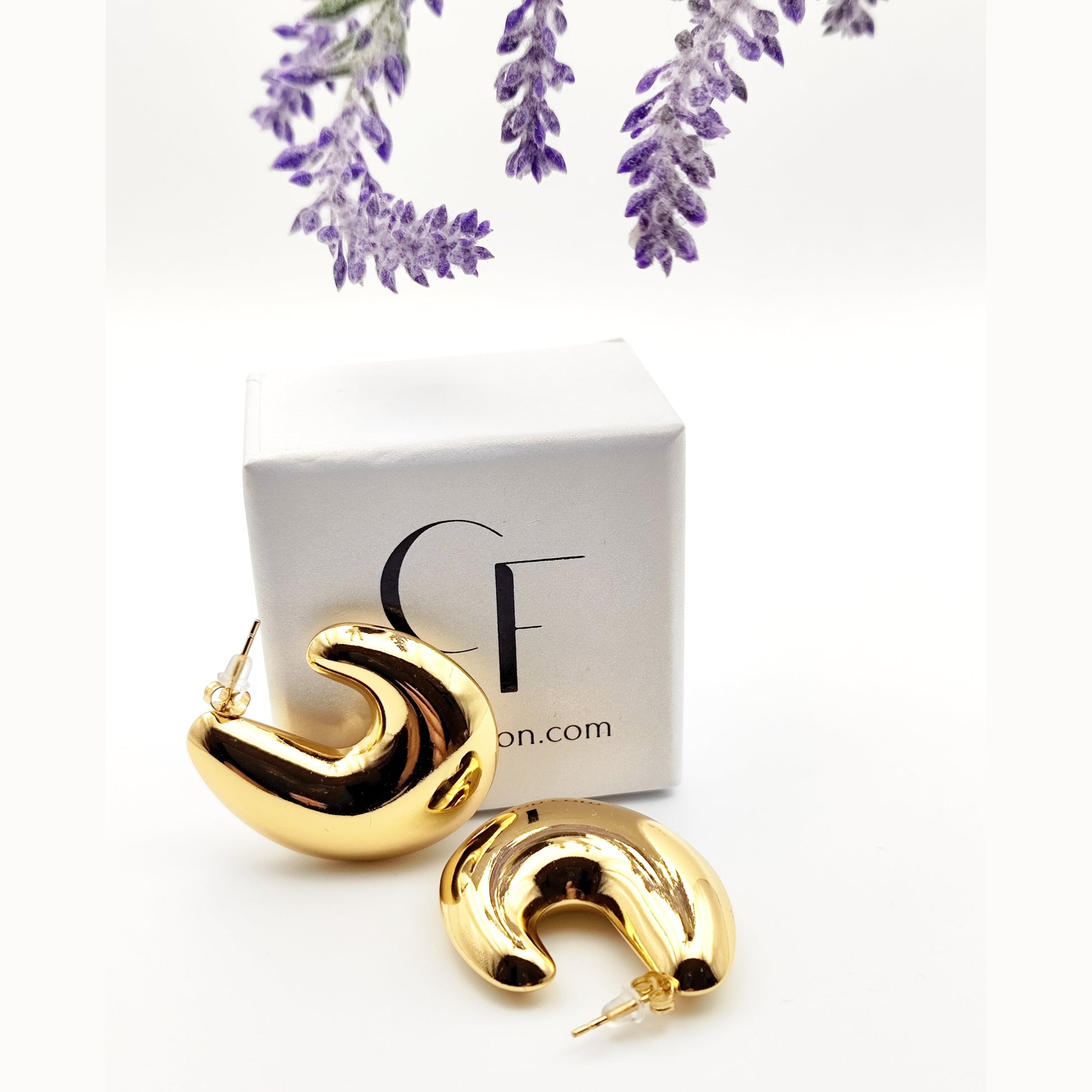 Bold chunky solid stainless steel hoop earrings in gold and silver