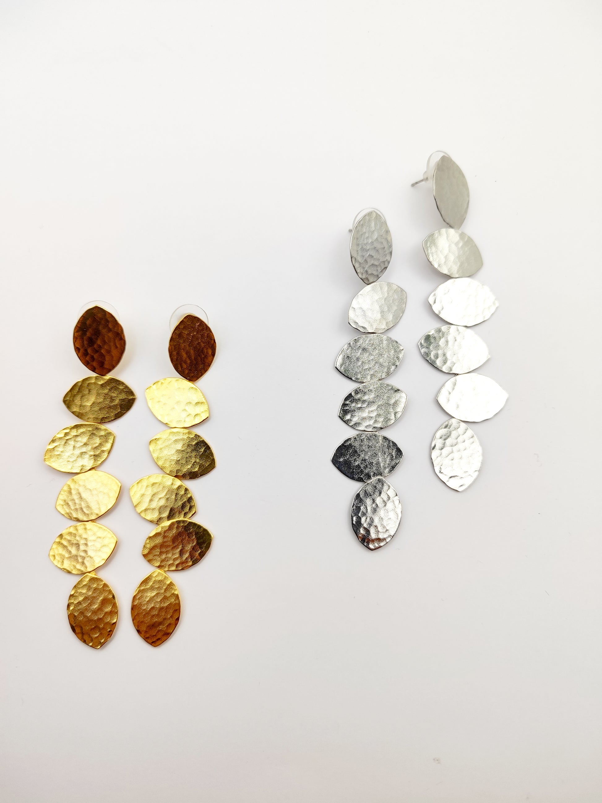 Trifyllon Earrings – Greek Hammered Jewelry – Available in 18K Gold, Silver, and Rose Gold Plated. Cascading hammered leaf design inspired by ancient Greek nature symbolism.
