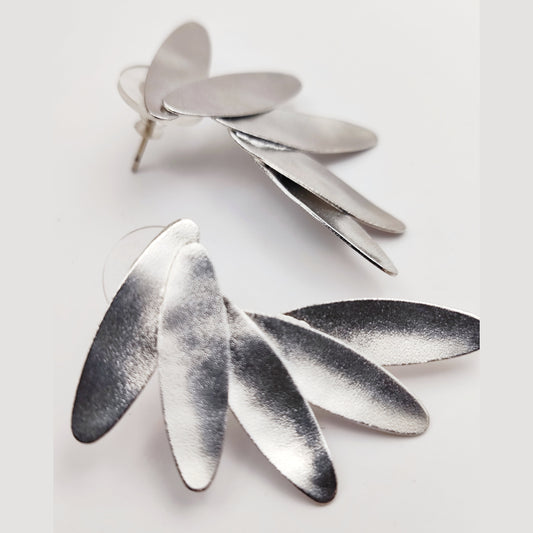 Angelos earrings – Greek hammered jewelry in 18K gold plated, 18K silver plated, and rose gold plated. Handcrafted hammered wing-inspired design.