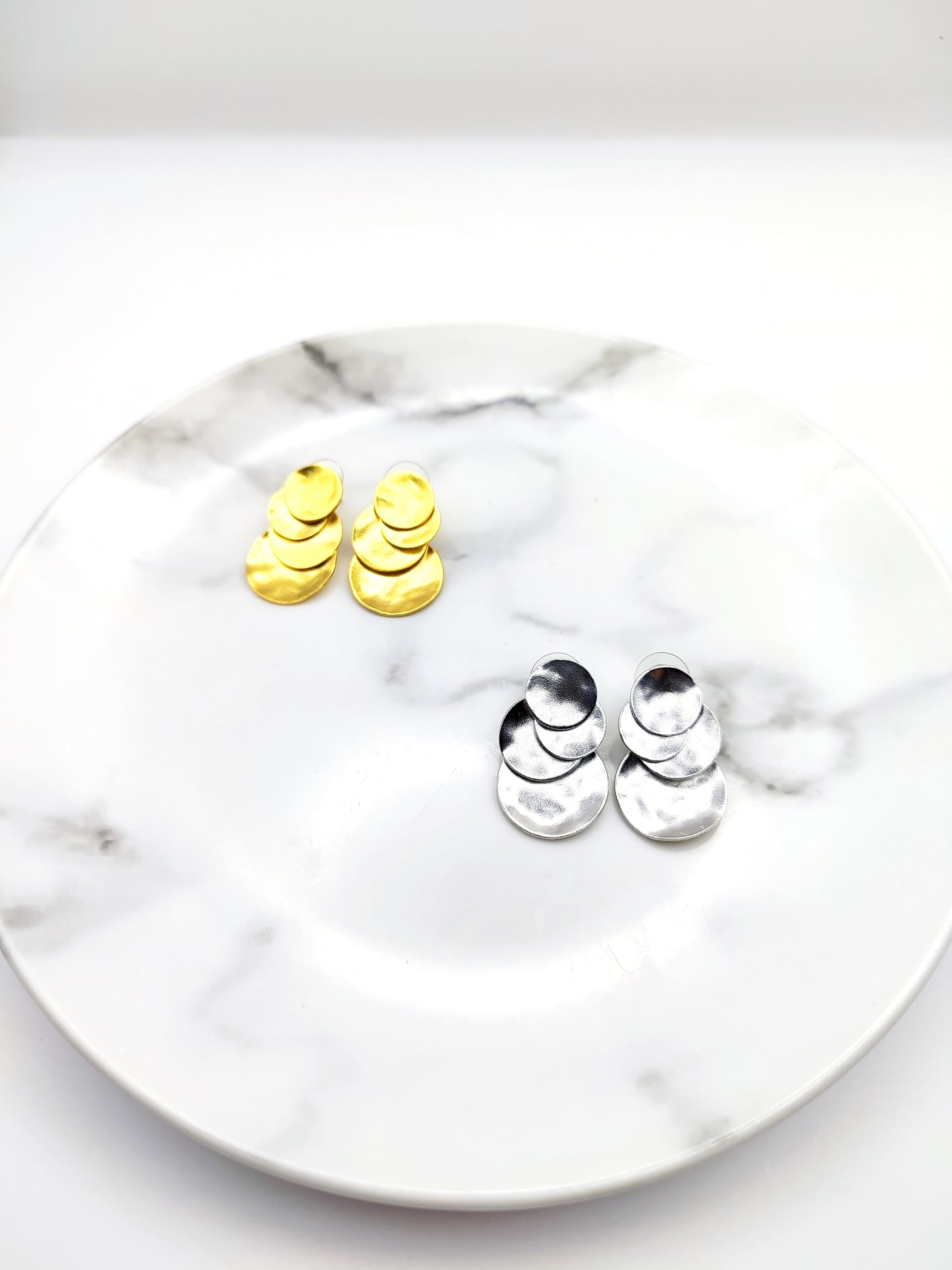 Ampelos earrings – Greek hammered jewelry in 18K gold plated, 18K silver plated, and rose gold plated. Handcrafted layered circular design inspired by the vine.