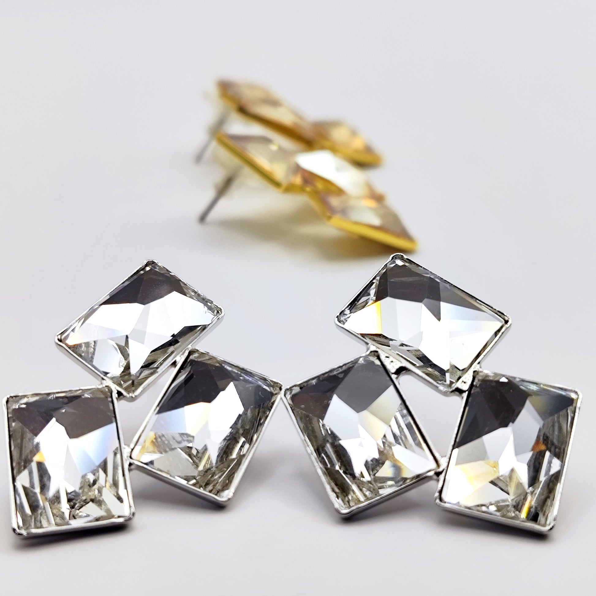 Crete Earrings with Crystal – Greek hammered jewelry in 18K gold plated, 18K silver plated, and rose gold plated. Handcrafted earrings with bold geometric faceted crystal design inspired by Minoan Crete.