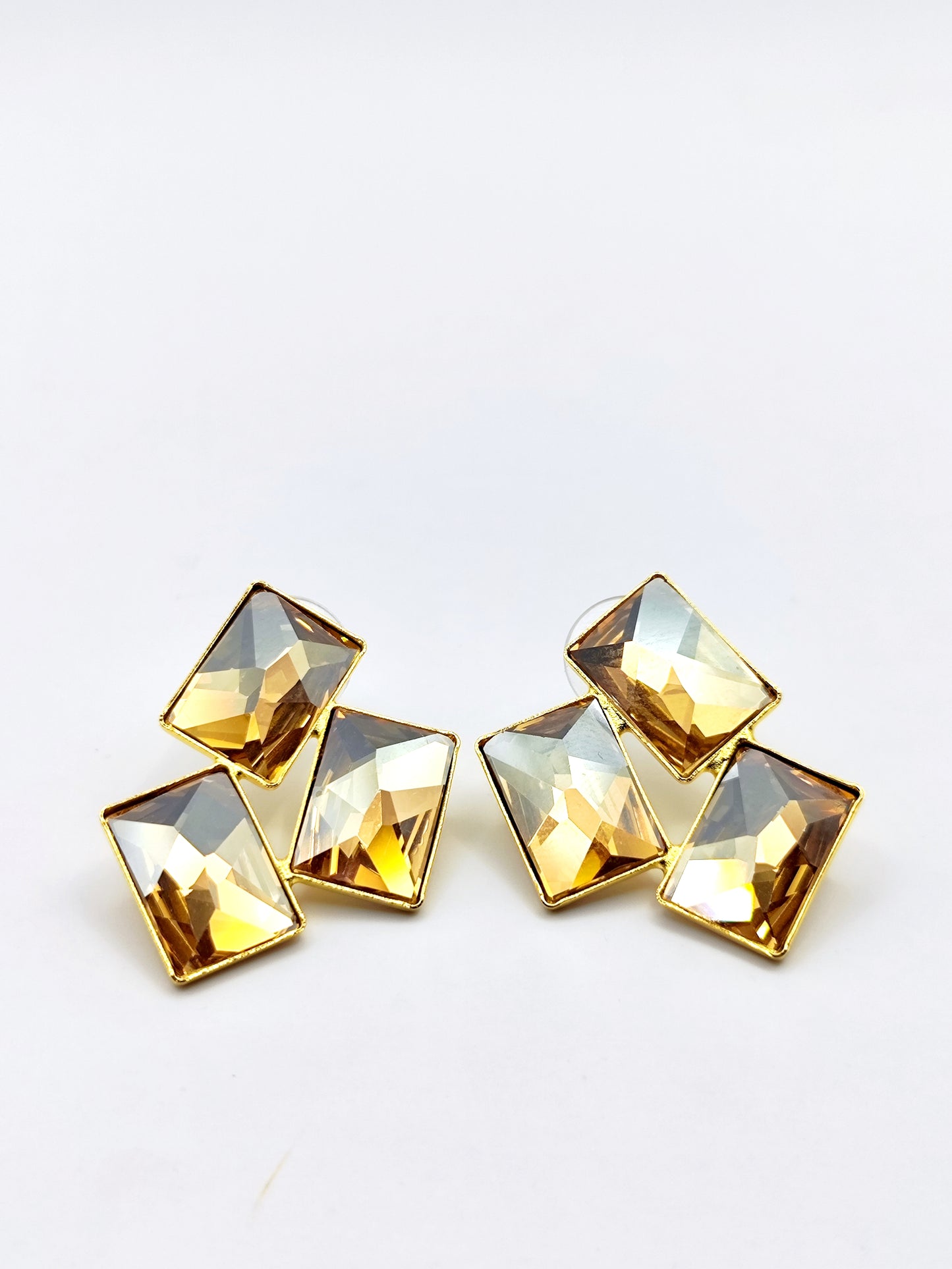 Crete Earrings with Crystal – Greek hammered jewelry in 18K gold plated, 18K silver plated, and rose gold plated. Handcrafted earrings with bold geometric faceted crystal design inspired by Minoan Crete.