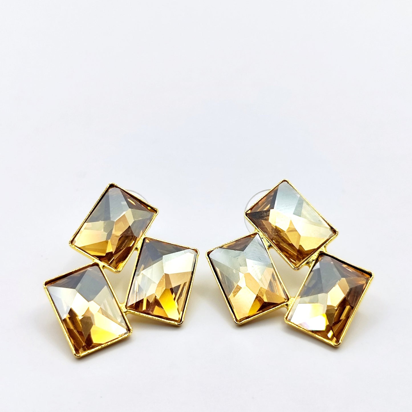 Crete Earrings with Crystal – Greek hammered jewelry in 18K gold plated, 18K silver plated, and rose gold plated. Handcrafted earrings with bold geometric faceted crystal design inspired by Minoan Crete.