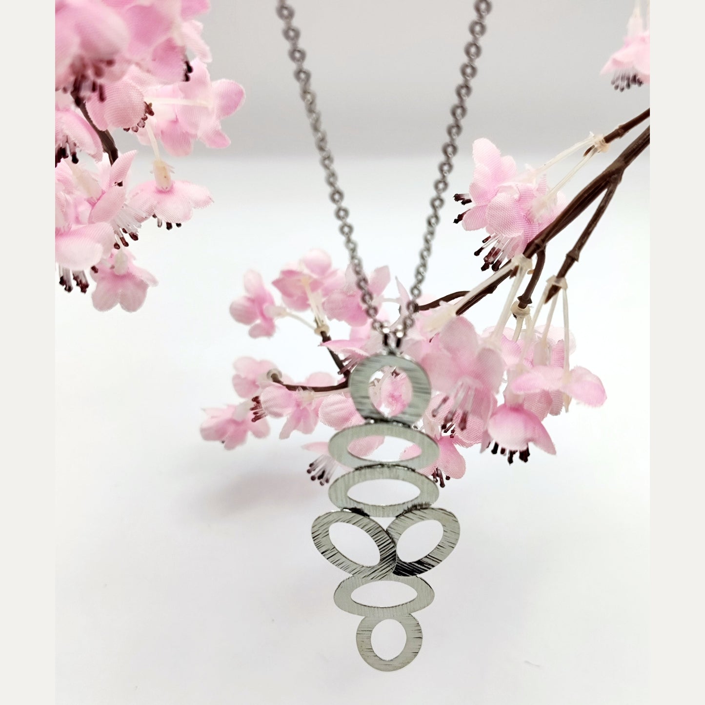 Handcrafted Amphora necklace, Greek hammered jewelry, silver plated, vertical graduated oval cut-out design