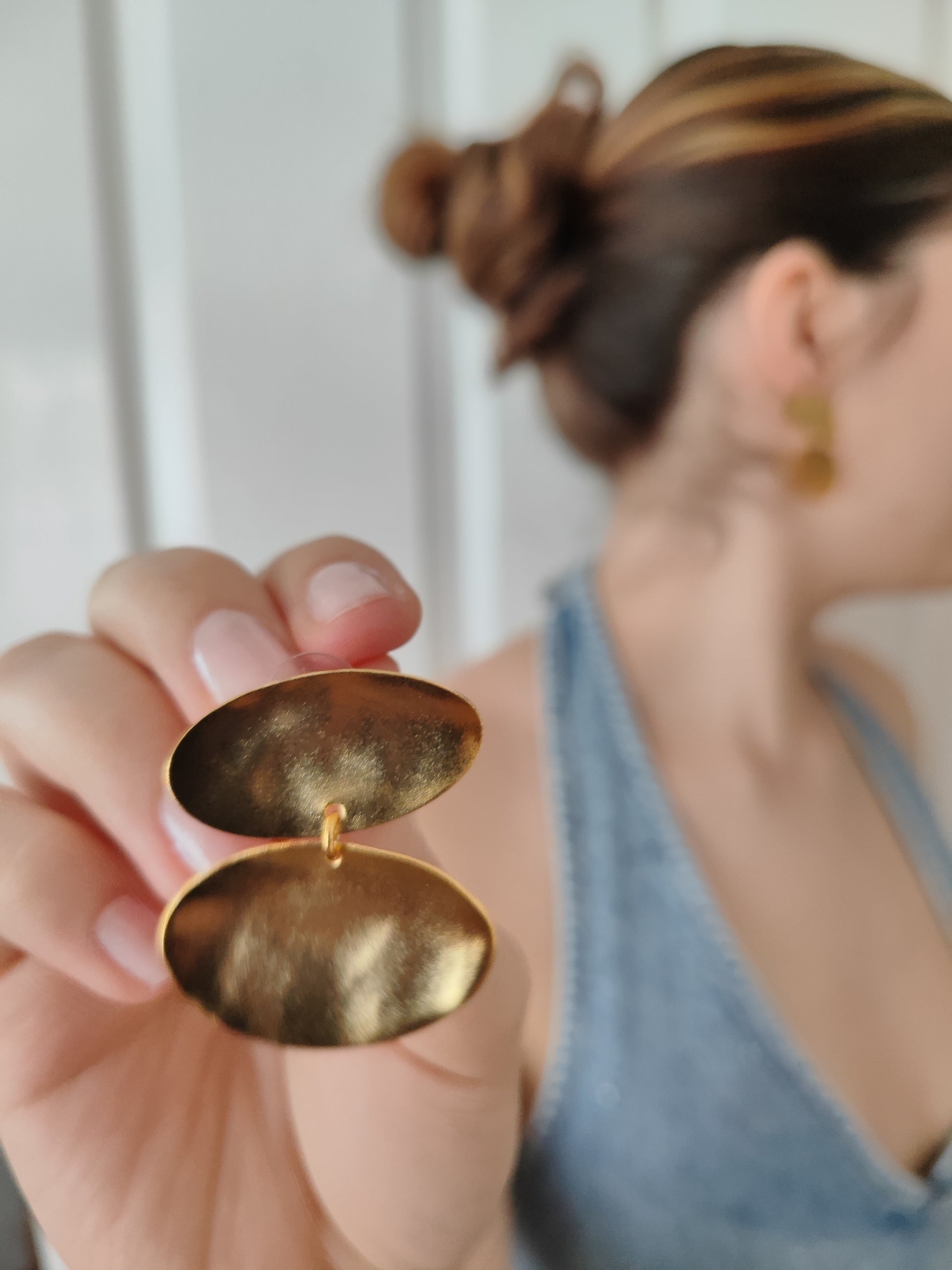 Heliades Earrings – Greek Hammered Jewelry – Available in 18K Gold, Silver, and Rose Gold Plated. Radiant hammered circular discs inspired by the daughters of the Sun.