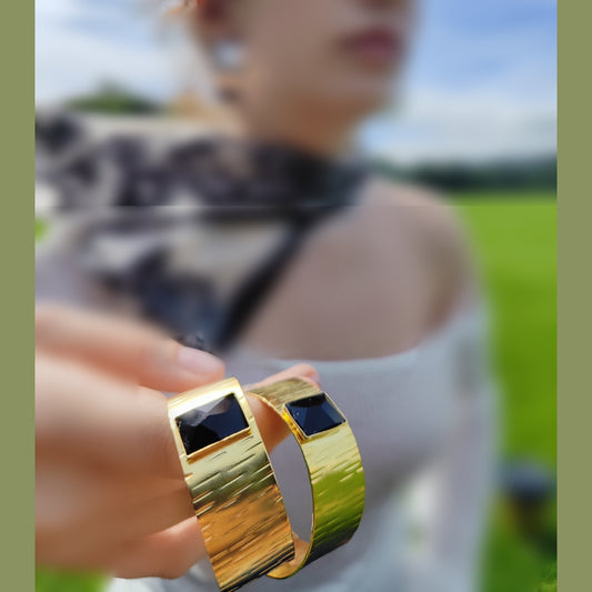 Inspired by Ionian columns and sea. 18K gold, silver, crystals
