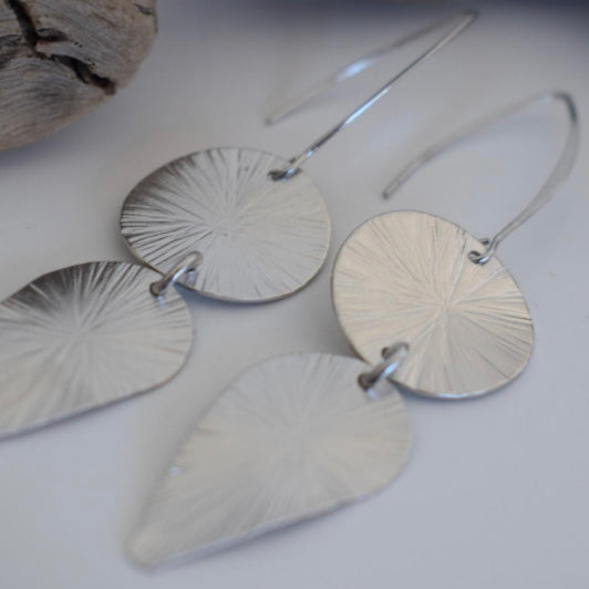 Handmade 18k gold plated earrings with sunburst disc and elongated leaf design, inspired by ancient Greek artistry