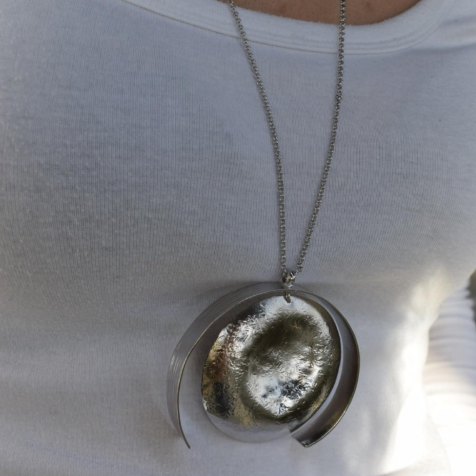 Eos Necklace – Greek Hammered Jewelry – 18K Gold, Silver, or Rose Gold Plated. Handmade circular hammered pendant with sculptural curves inspired by the goddess of dawn.