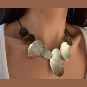 Nausicaa Necklace – Greek Hammered Jewelry – 18K Gold, Silver, or Rose Gold Plated. Statement necklace with hammered overlapping ovals inspired by sea waves.