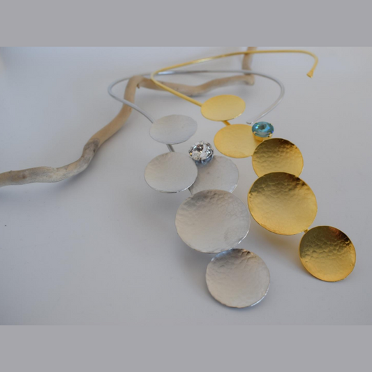 Diskos Necklace With Crystal – Greek Hammered Jewelry – 18K Gold, Silver, or Rose Gold Plated. Vertical hammered discs with crystal accent.