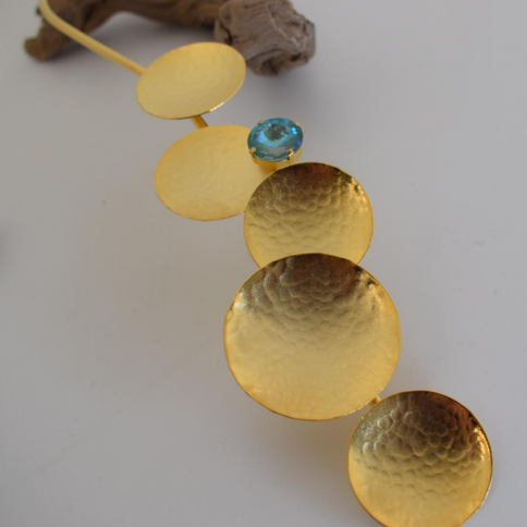 Diskos Necklace With Crystal – Greek Hammered Jewelry – 18K Gold, Silver, or Rose Gold Plated. Vertical hammered discs with crystal accent.