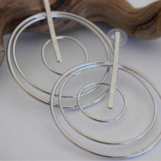 Handmade 18k gold plated triple spiral hoop earrings with vertical hammered bar, inspired by the cosmos and ancient Greek design