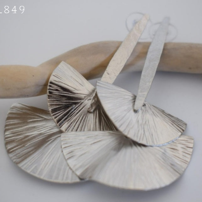 Handmade 18k gold plated double fan-shaped earrings inspired by the waves of the Aegean Sea, with textured hammered finish