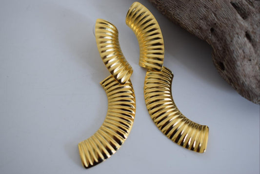 Skiron earrings in handmade Greek hammered jewelry design, available in gold plated and silver plated finishes.