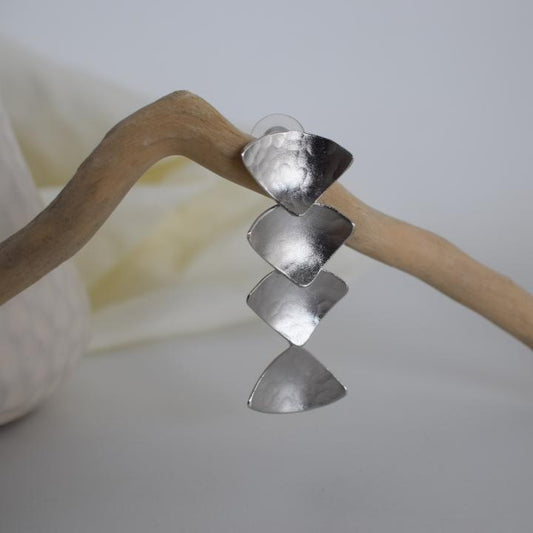 Echo earrings in handmade Greek hammered jewelry design, available in gold plated and silver plated finishes.