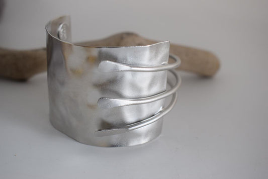 Mycenae bracelet – Greek hammered jewelry with layered cuff design, inspired by Mycenaean treasures, available in 18K gold-plated, 18K silver-plated, and rose-gold plated finishes.