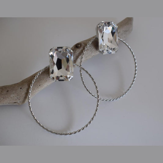 Okeanos2 earrings in handmade Greek hammered jewelry design with a fine crystal, available in gold plated and silver plated finishes.