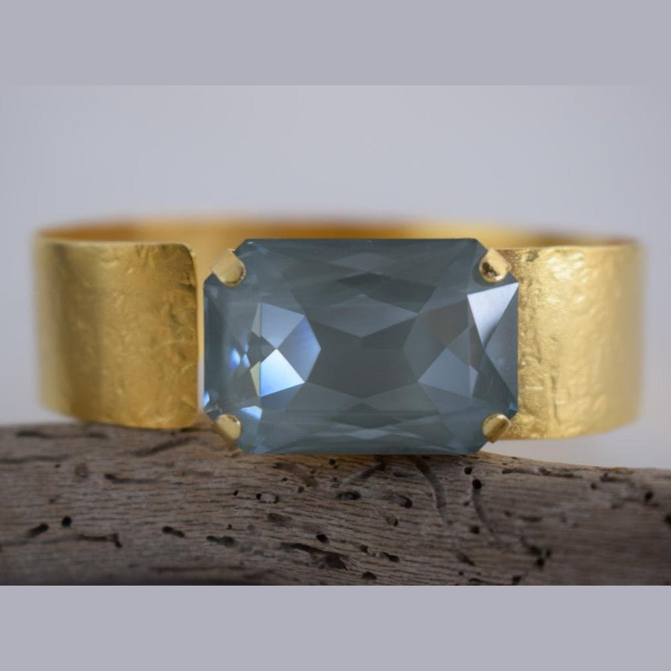 Okeanos bracelet Greek hammered jewelry with emerald-cut crystal in 18K gold, silver, and rose gold plated finish.