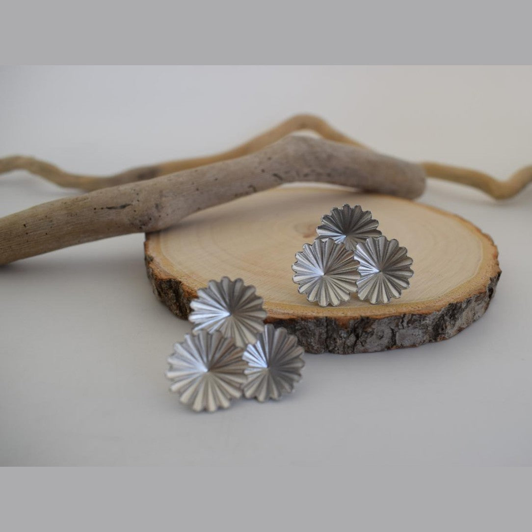 Florina earrings in Greek hammered jewelry design with floral texture, available in 18K gold plated and 18K silver plated finishes.
