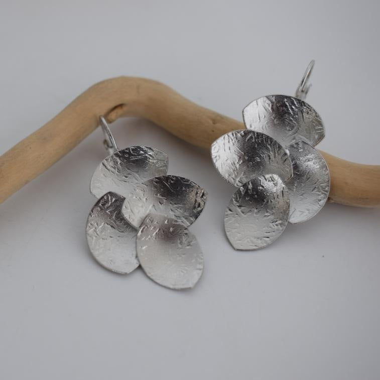 Calypso3 handmade Greek hammered earrings with layered discs, available in gold plated and silver plated.