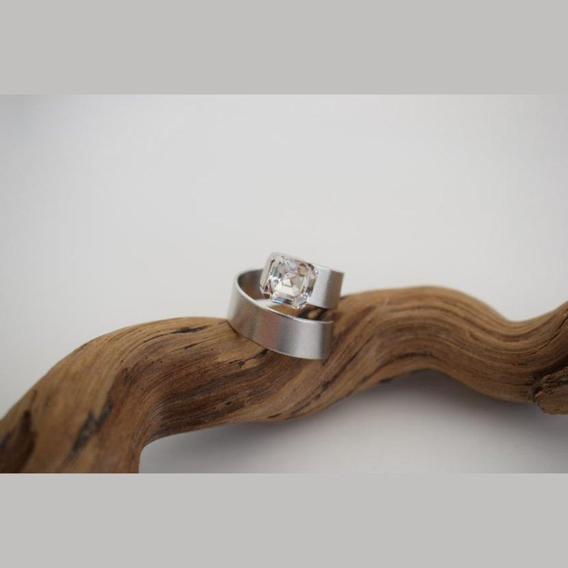 Okeanos Ring – Handmade Greek Hammered Jewelry bold adjustable band with fine crystal available in 18K gold plated and 18K silver plated finishes.