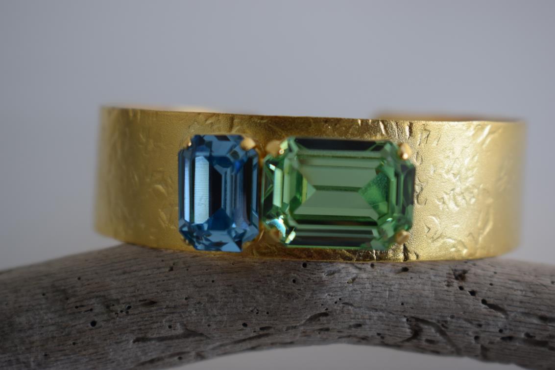 Electra bracelet – Greek hammered jewelry cuff with emerald-cut crystals, inspired by the radiant heroine Electra, available in 18K gold-plated, 18K silver-plated, and rose-gold plated finishes.