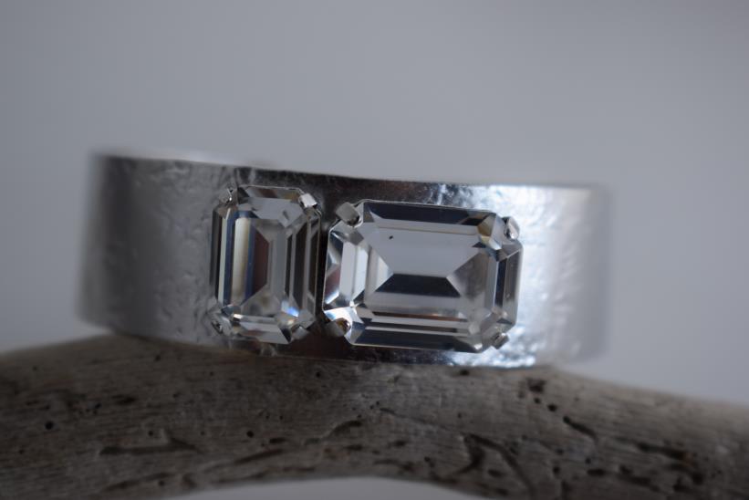 Electra bracelet – Greek hammered jewelry cuff with emerald-cut crystals, inspired by the radiant heroine Electra, available in 18K gold-plated, 18K silver-plated, and rose-gold plated finishes.