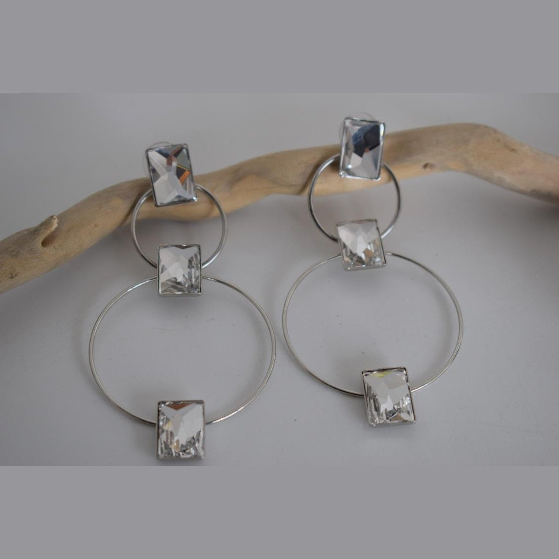 Ionio earrings with crystal – Greek hammered jewelry with hoops and faceted stones, inspired by the Ionian Sea, available in 18K gold-plated, 18K silver-plated, and rose-gold plated finishes.