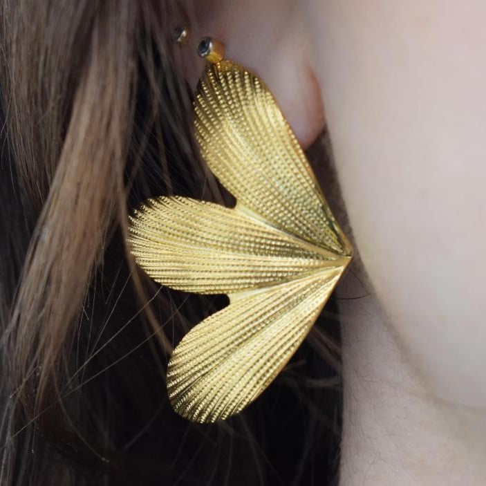 Narkissos earrings – Greek hammered jewelry with petal-inspired floral design, available in 18K gold-plated, 18K silver-plated, and rose-gold plated finishes.