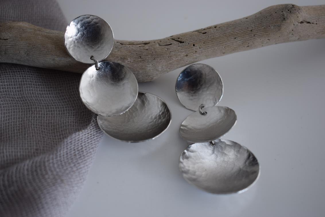 Dione earrings – Greek hammered jewelry with cascading hammered discs, available in 18K gold-plated, 18K silver-plated, and rose-gold plated finishes.