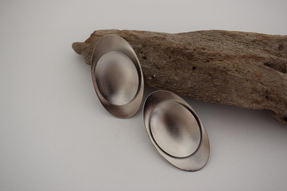 Ouranos earrings – Greek hammered jewelry with bold oval design, inspired by the god of the sky, available in 18K gold-plated, 18K silver-plated, and rose-gold plated finishes.