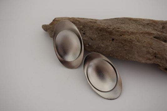 Ouranos earrings – Greek hammered jewelry with bold oval design, inspired by the god of the sky, available in 18K gold-plated, 18K silver-plated, and rose-gold plated finishes.