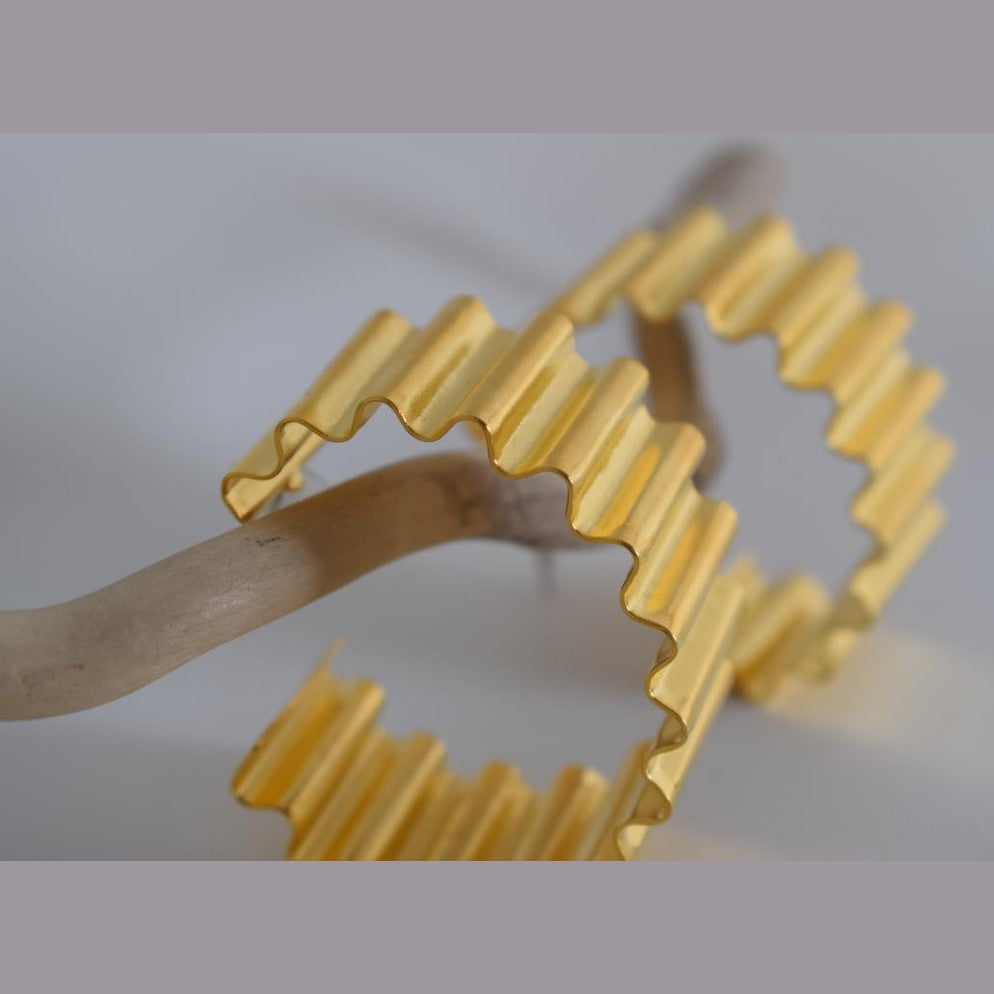 Rhythmis earrings – Greek hammered jewelry available in 18K gold plated, 18K silver plated, and rose gold plated.