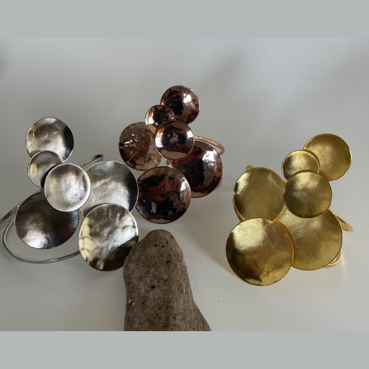 Ampelos bracelet – Greek hammered jewelry with grape motif, available in 18K gold-plated, 18K silver-plated, and rose-gold plated finishes.