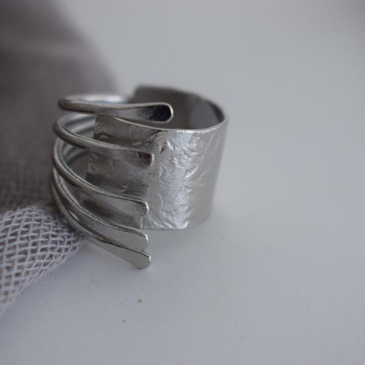 Mycenae ring – Greek hammered jewelry with spiral hammered design, inspired by Mycenaean treasures, available in 18K gold-plated, 18K silver-plated, and rose-gold plated finishes.