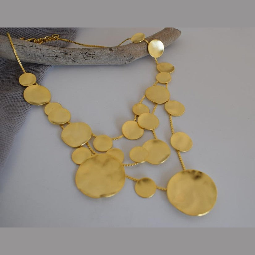 Mycenae necklace with hammered disc design inspired by Mycenaean gold treasures. Greek hammered jewelry in 18K gold, silver, or rose gold plating.