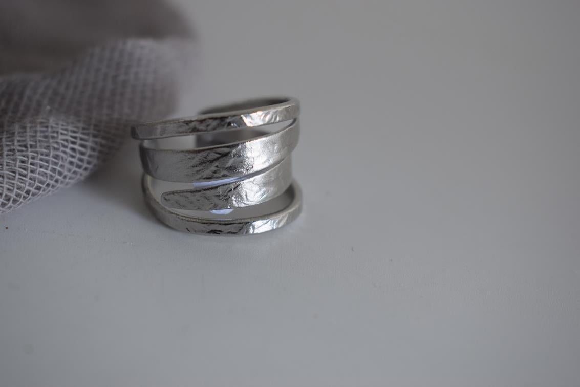 Knossos ring Greek hammered jewelry with elegant spiral design, available in gold, silver, and rose gold plated.