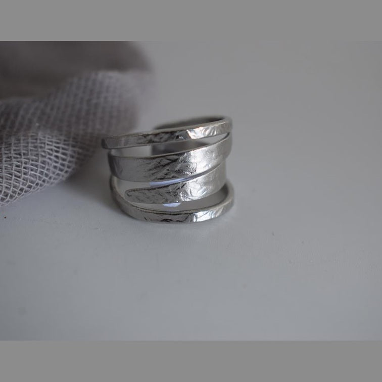 Knossos ring Greek hammered jewelry with elegant spiral design, available in gold, silver, and rose gold plated.