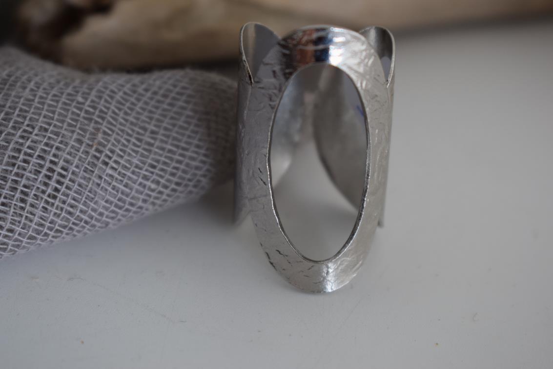 Aegis ring Greek hammered jewelry with bold open oval design, available in gold, silver, and rose gold plated.