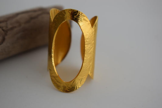 Aegis ring Greek hammered jewelry with bold open oval design, available in gold, silver, and rose gold plated.