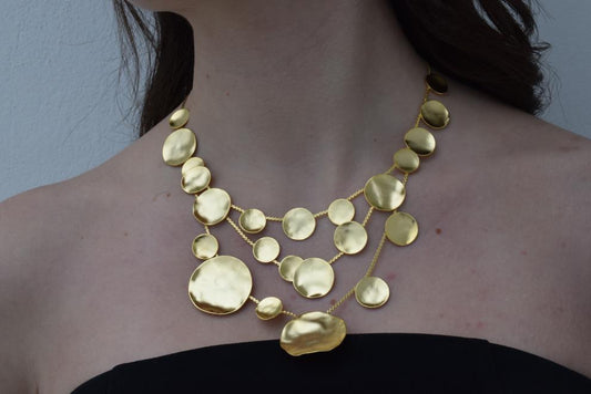 Mycenae necklace with hammered disc design inspired by Mycenaean gold treasures. Greek hammered jewelry in 18K gold, silver, or rose gold plating.