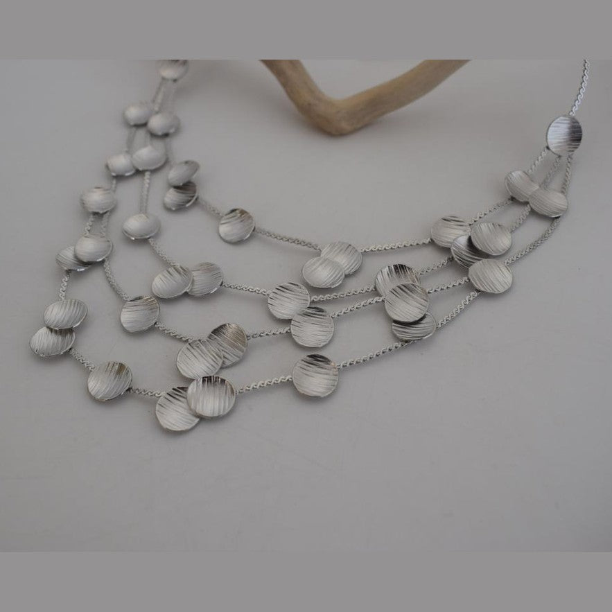 Kypros2 Necklace – Handmade Greek hammered jewelry with layered hammered disc design, available in 18K gold and silver plated.